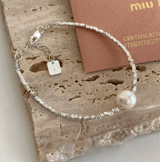 Srebrna kwadratowa bransoletka Miłość